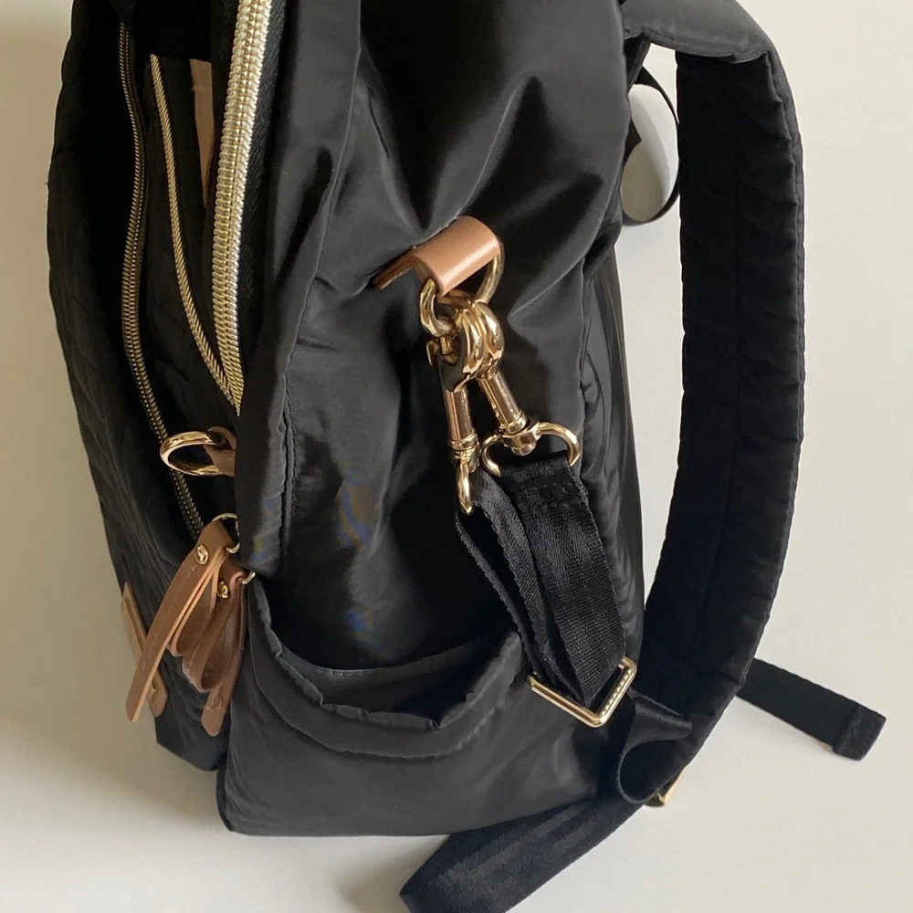 Skip Hop Black Quilted Multifunctional Backpack with Tan and gold accents